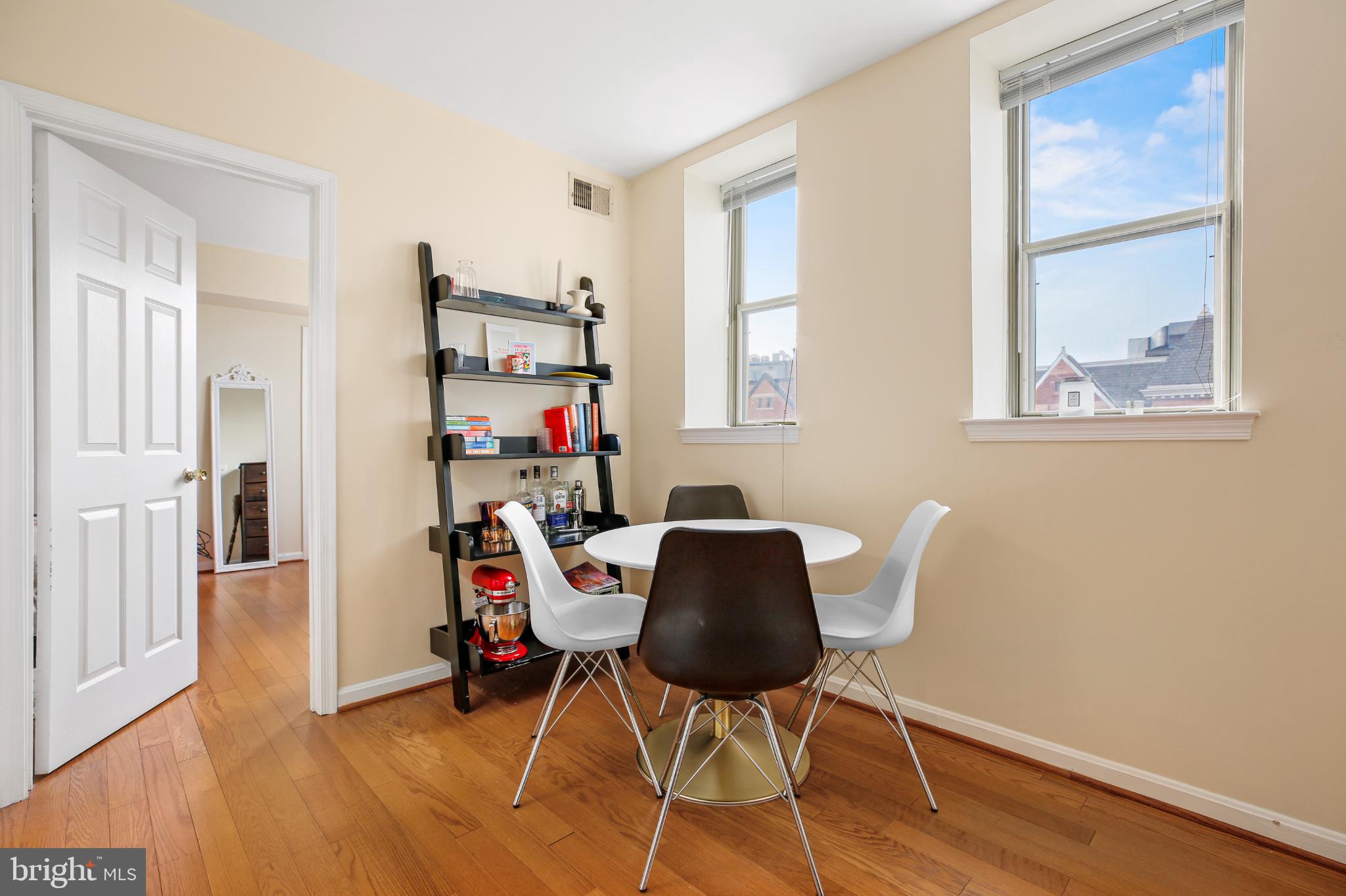 1920 S Street Northwest, Unit 404 Washington, DC 20009 - Photo 9 of 25 a view of a workspace with furniture and a window