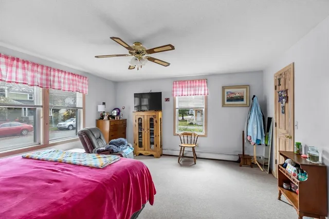 a view of a bedroom with gym equipment