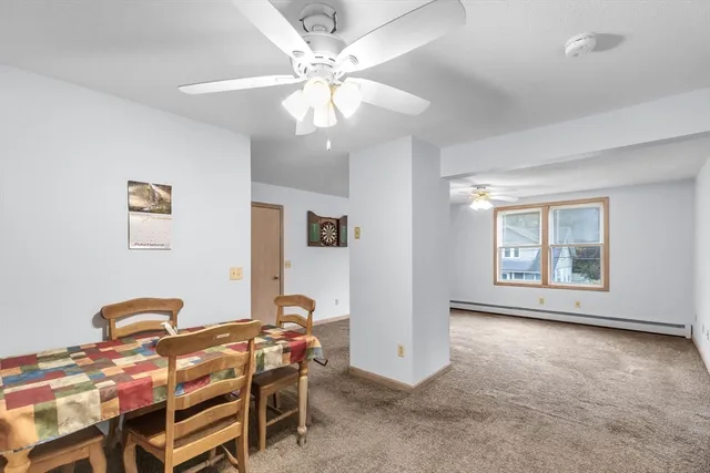 a view of a livingroom with furniture and chandelier