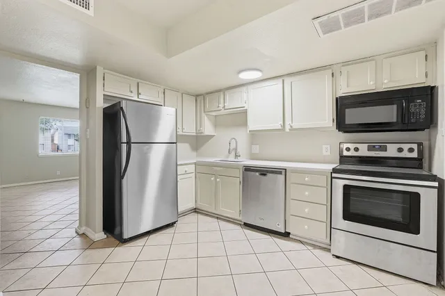 $1,499 | 8809 Dawnridge Circle, Unit 102, Austin, TX 78757