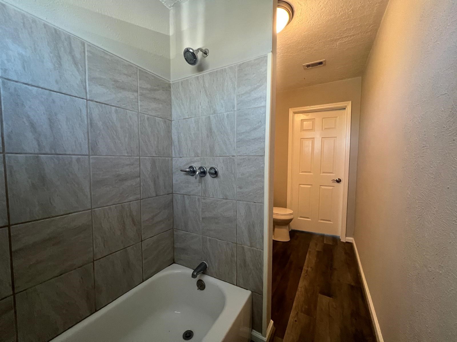7106 Summer Lane Rosharon, TX 77583 - Photo 10 of 13 a bathroom with a sink and a shower