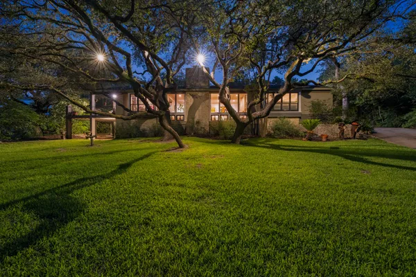 a view of a trees with a big yard