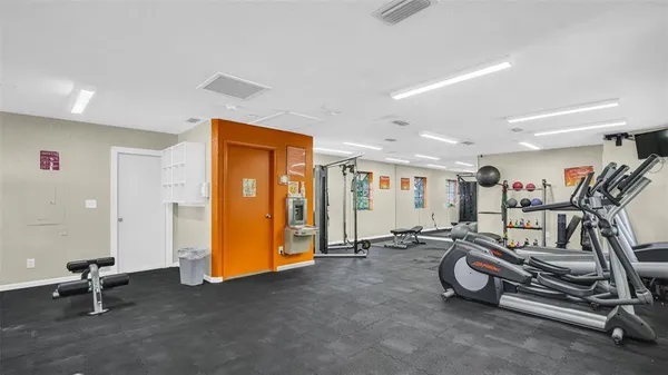 a view of a room with gym equipment