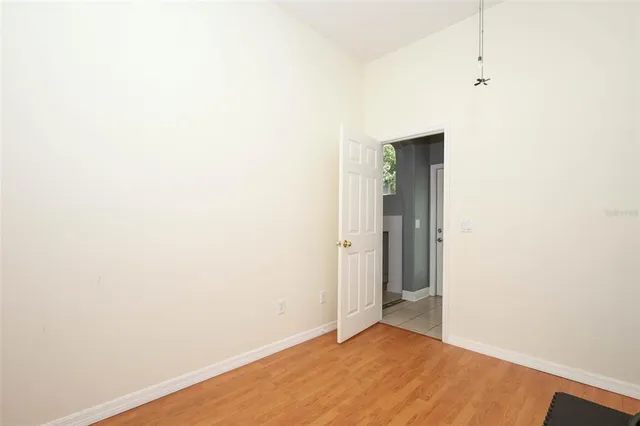 a view of a patio with a table and chairs and couches