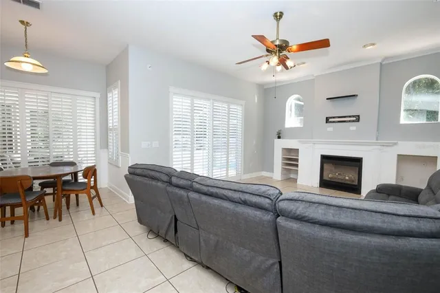 a view of a backyard with large trees