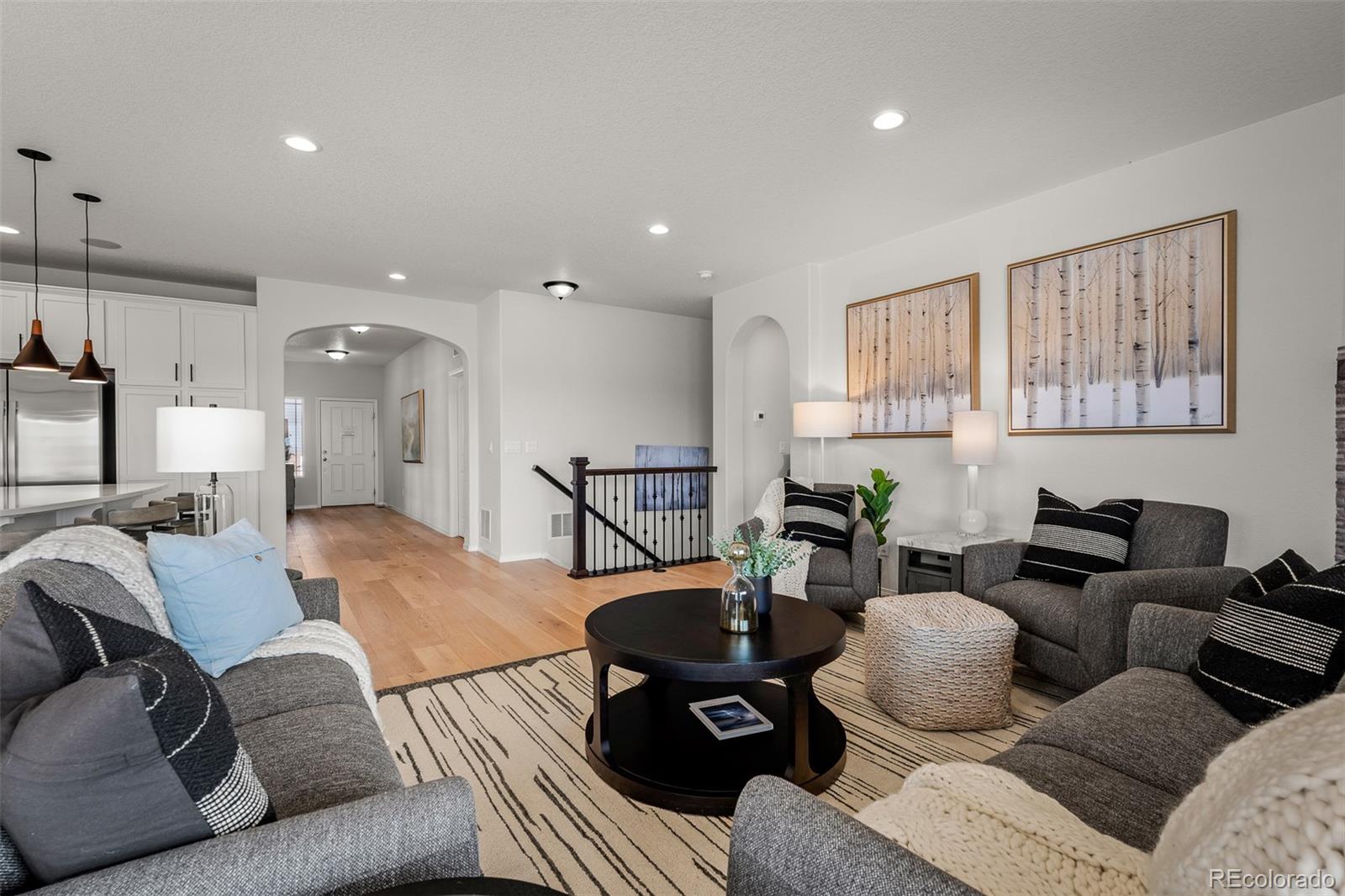 13410 New Ranch Drive Peyton, CO 80831 - Photo 16 of 50 a living room with furniture kitchen view and a large window