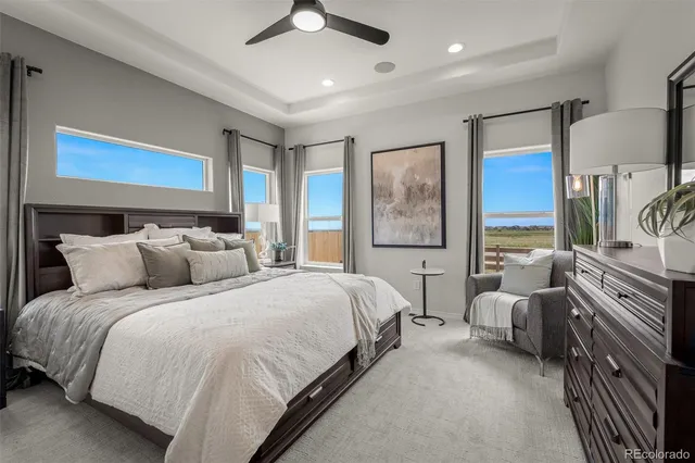 a bedroom with bed and window