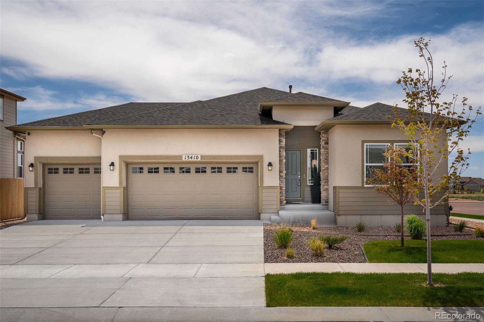 13410 New Ranch Drive Peyton, CO 80831 - Photo 2 of 50 a front view of a house