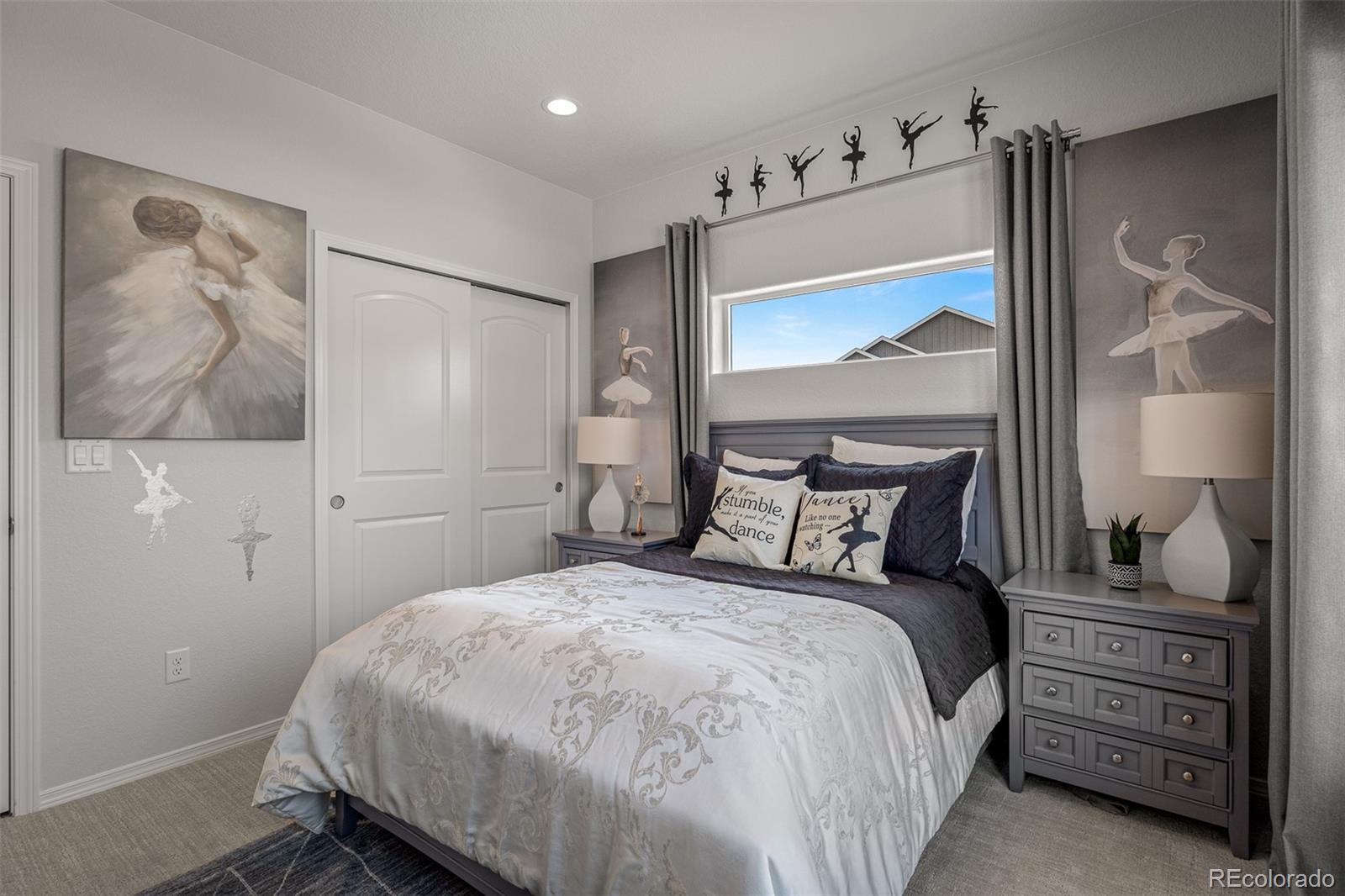 13410 New Ranch Drive Peyton, CO 80831 - Photo 32 of 50 a bedroom with a bed and a painting on the wall