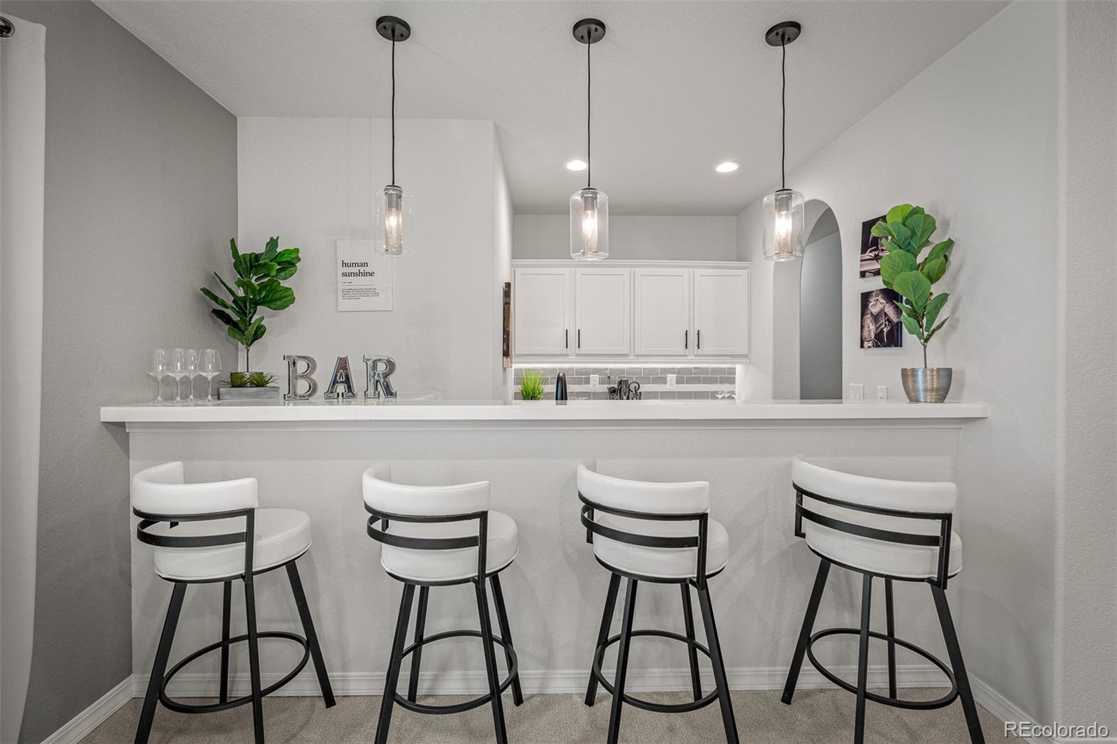 13410 New Ranch Drive Peyton, CO 80831 - Photo 40 of 50 a kitchen with a table and chairs in it