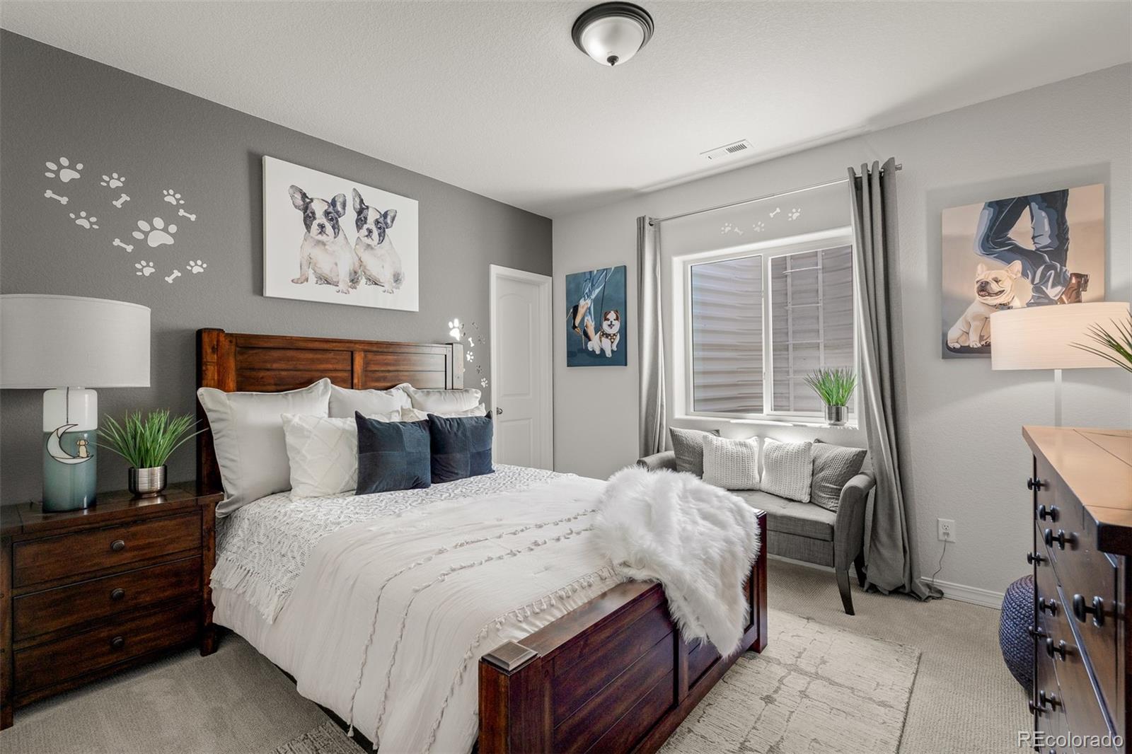 13410 New Ranch Drive Peyton, CO 80831 - Photo 42 of 50 a bed room with a bed and a night stand