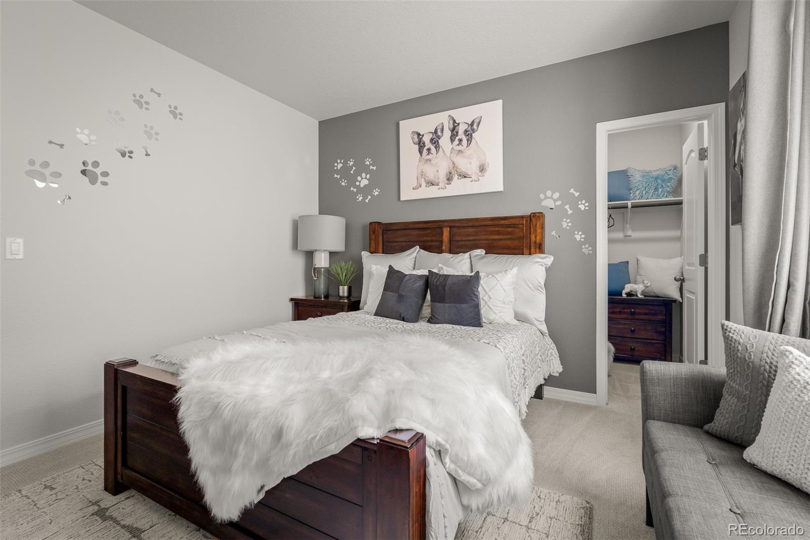 13410 New Ranch Drive Peyton, CO 80831 - Photo 43 of 50 a bedroom with a bed and couch