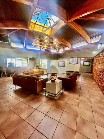 a outdoor space with lots of white furniture