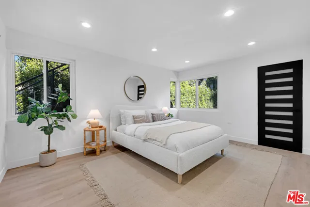 a kitchen with a stove and cabinets