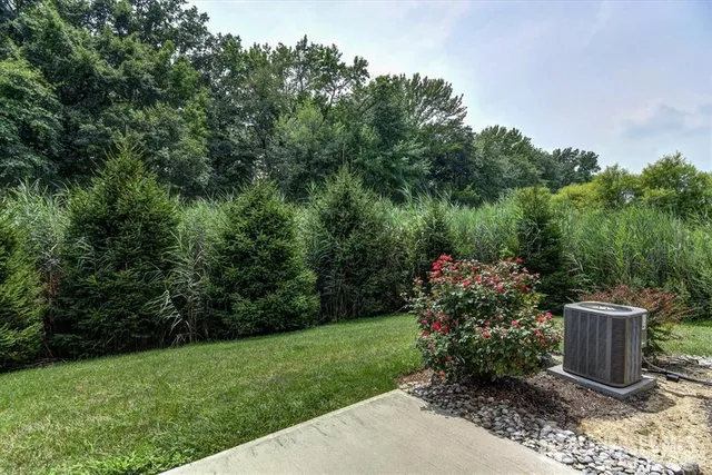 a view of a garden with a fountain