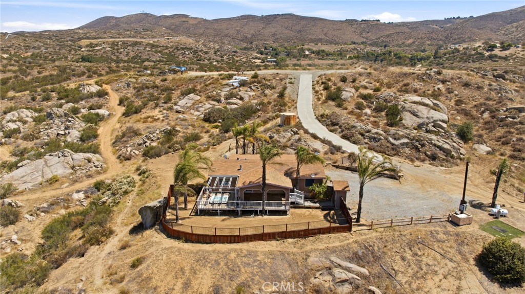 40100 Owl Valley Road Temecula, CA 92592 - Photo 12 of 44 a view of a water with a mountain in the background