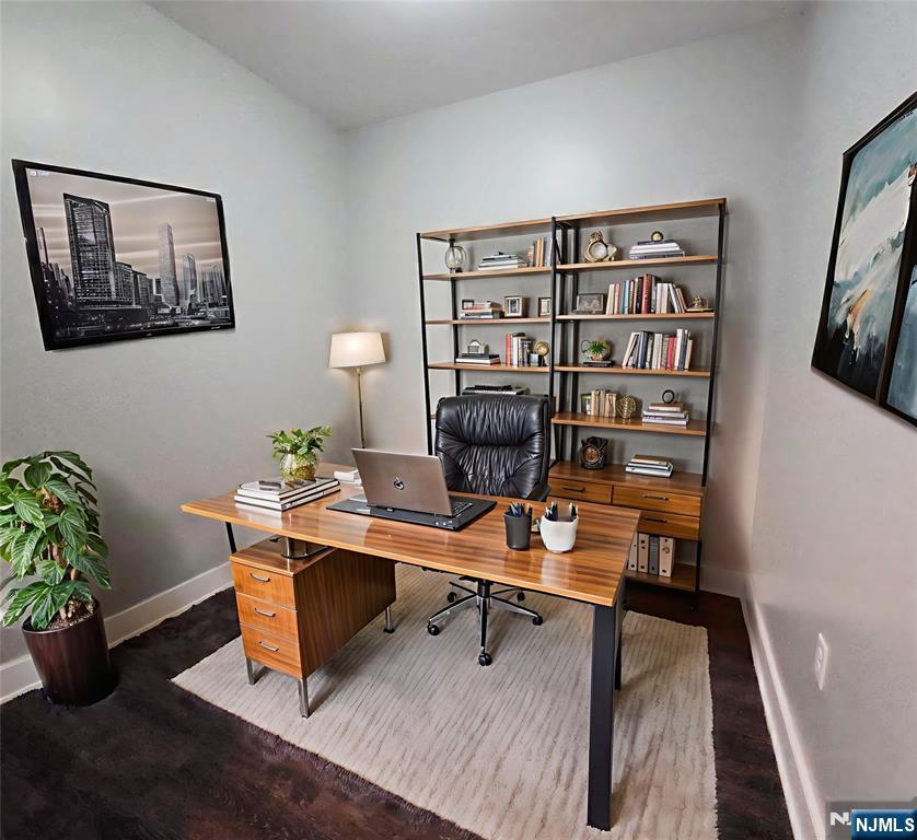 235 Ridge Road North Arlington, NJ 07031 - Photo 8 of 13 a workspace with furniture and rug