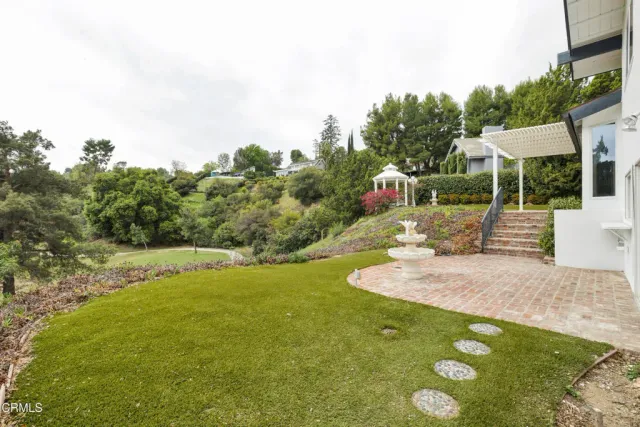 a view of a playground with basketball court