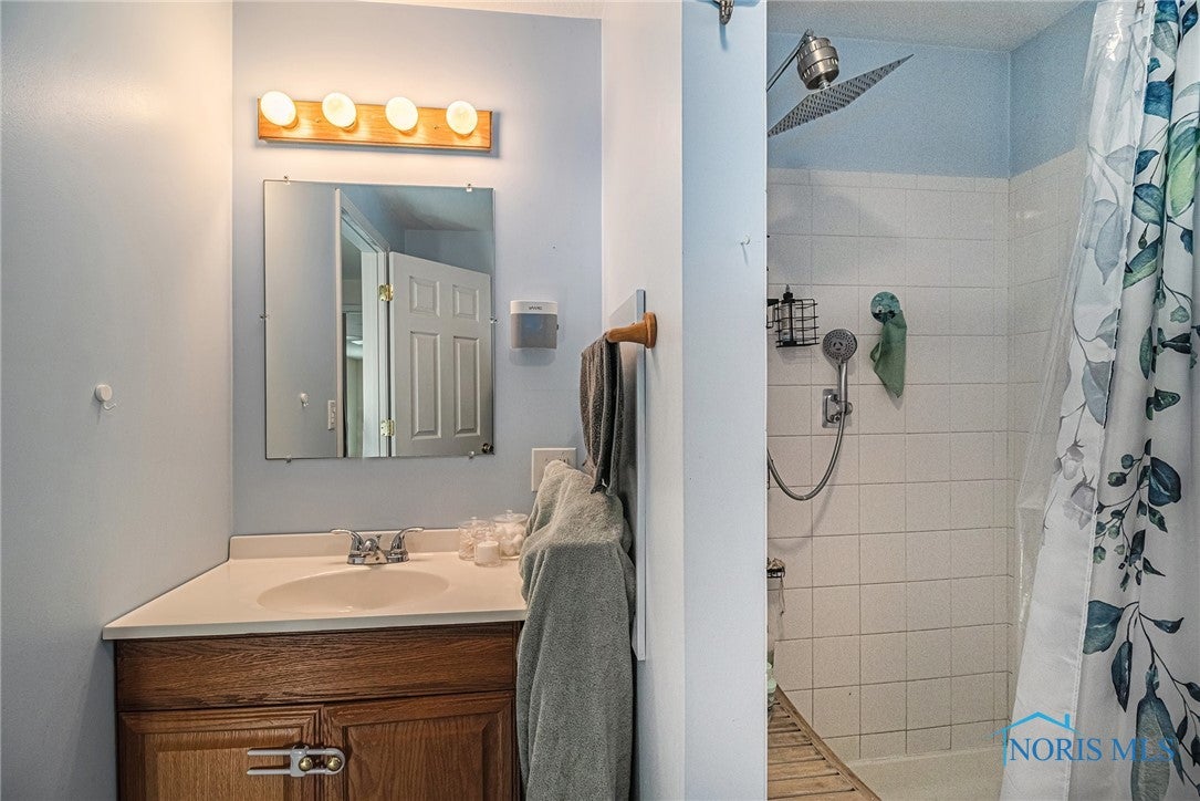 15734 Williams County Rd F Bryan, OH 43506 - Photo 11 of 17 primary suite bathroom with spa like shower