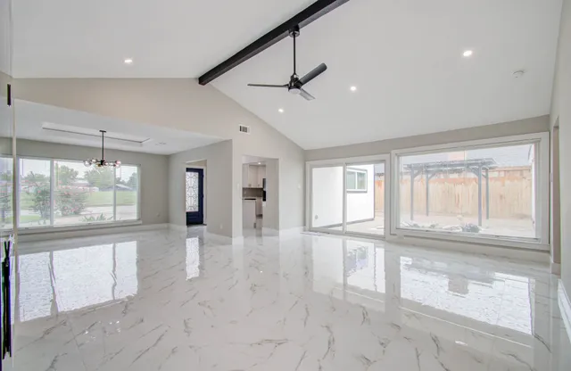 a kitchen with a sink stove and refrigerator