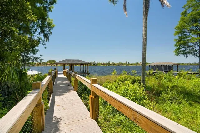 a view of outdoor space with wooden floor