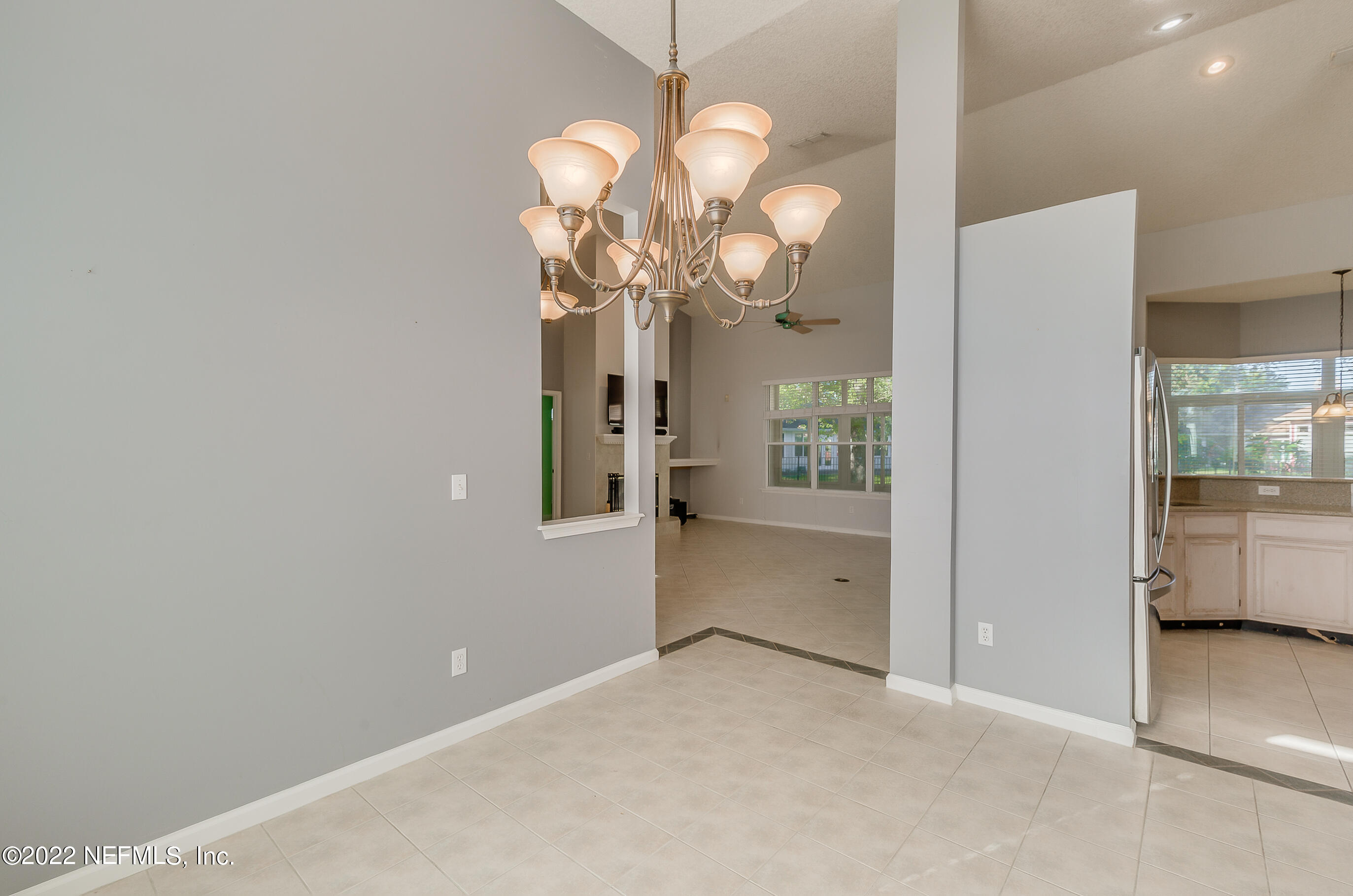 2004 Water Crest Drive Fleming Island, FL 32003 - Photo 13 of 51 a view of livingroom with chandelier