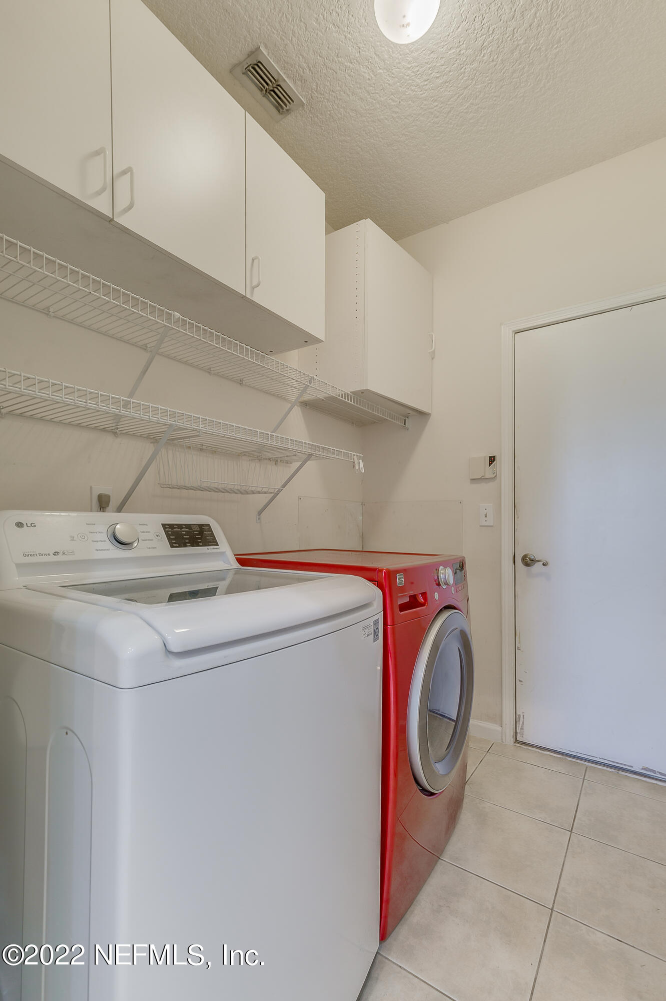 2004 Water Crest Drive Fleming Island, FL 32003 - Photo 37 of 51 a utility room with dryer and washer