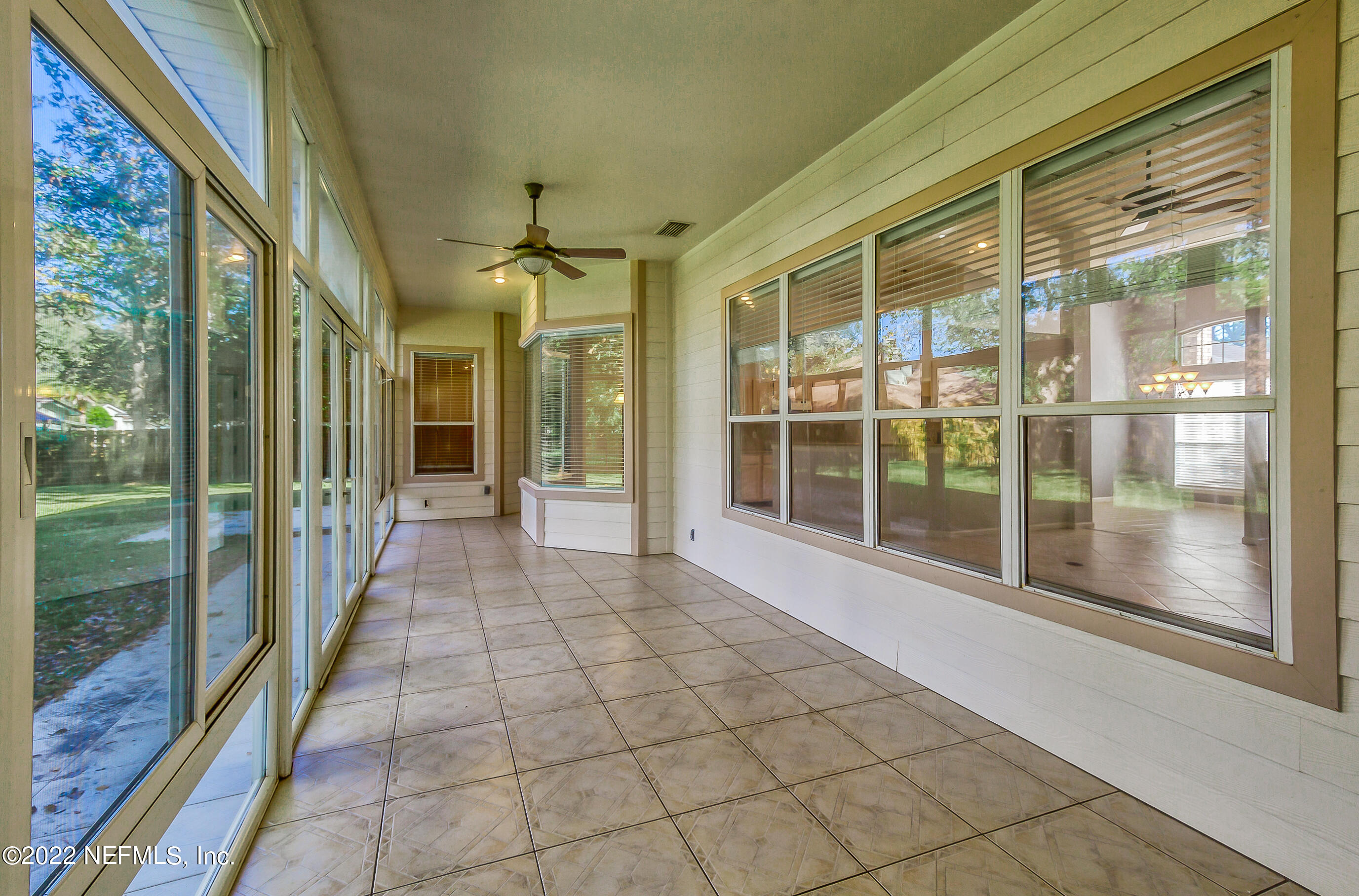 2004 Water Crest Drive Fleming Island, FL 32003 - Photo 38 of 51 a view of a house with a glass door