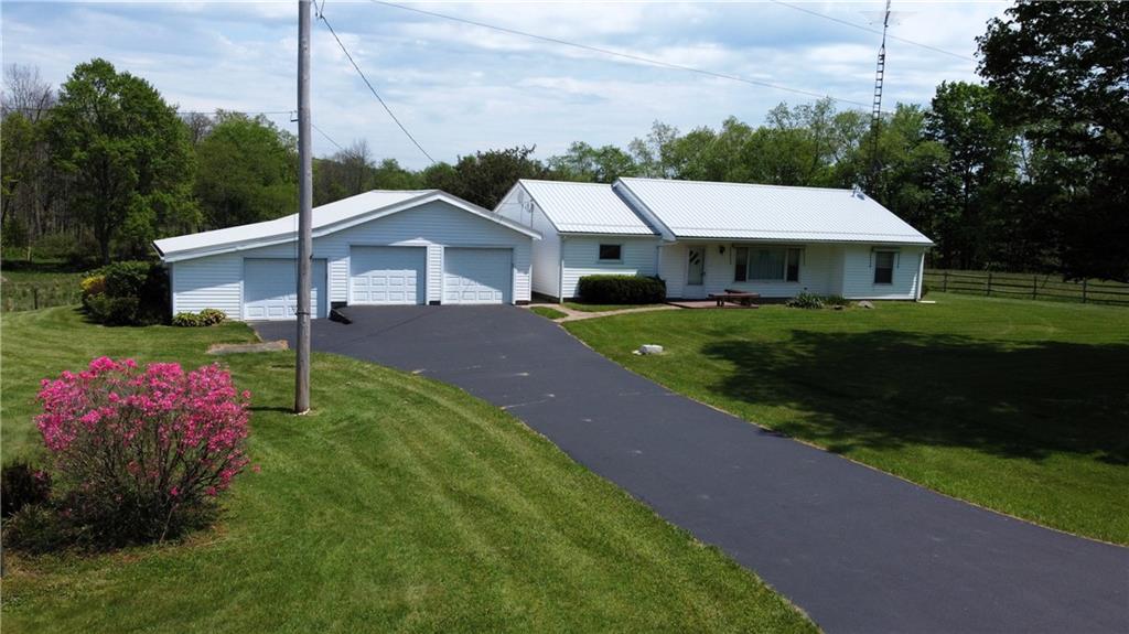 480 South Maysville Road Greenville, PA 16125 - Photo 3 of 20 a front view of a house with garden