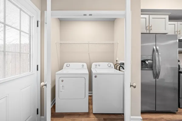 a utility room with dryer and washer