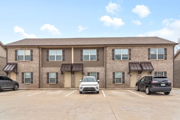 a car parked in front of a house