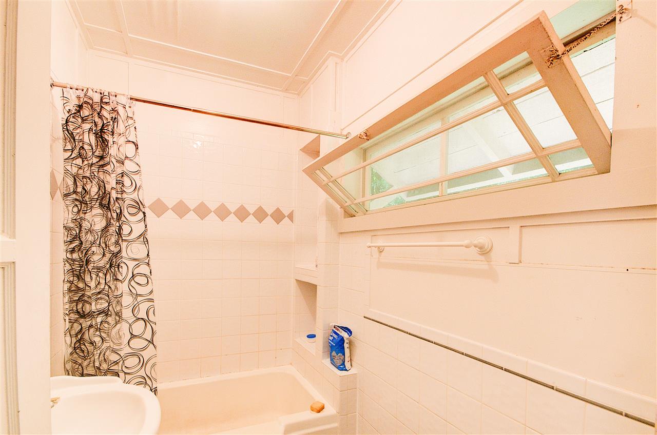 1089 West Kuiaha Road, Unit D Haiku, HI 96708 - Photo 10 of 25 a bathroom with a bathtub and a shower
