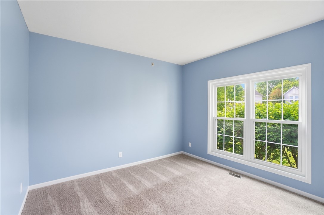 10 Chase Court Springboro, OH 45066 - Photo 10 of 75 This airy room offers ample natural light and a calming ambiance perfect for relaxation.