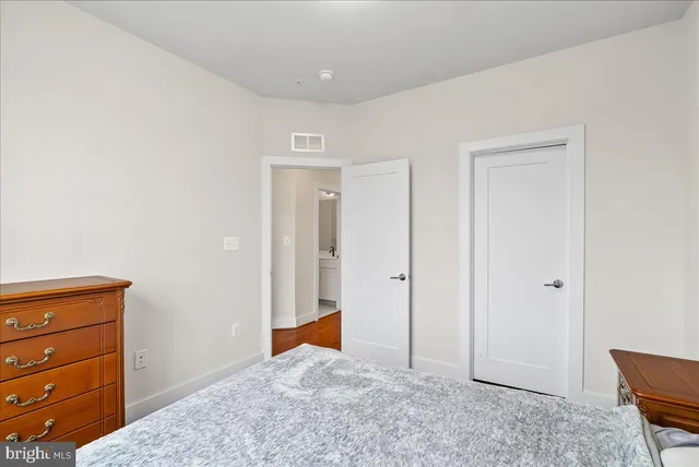 a view of a room with furniture and window