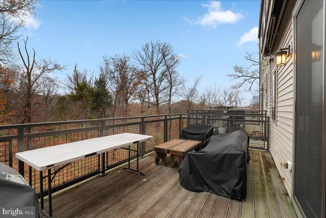 a view of a two chairs in the balcony