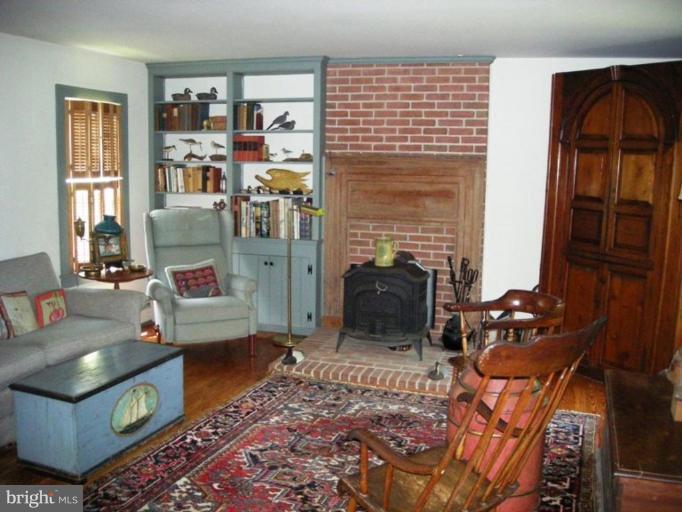 6329 Bozman Neavitt Road Neavitt, MD 21652 - Photo 6 of 19 Wonderful family room with wood stove