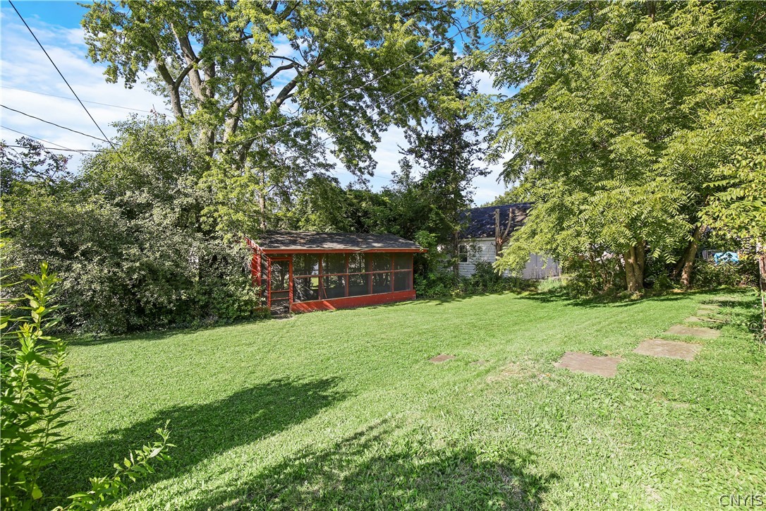 314 Deforest Road Syracuse, NY 13214 - Photo 32 of 40 Cute little covered outbuilding, great for outdoor living, or turn it into a greenhouse!