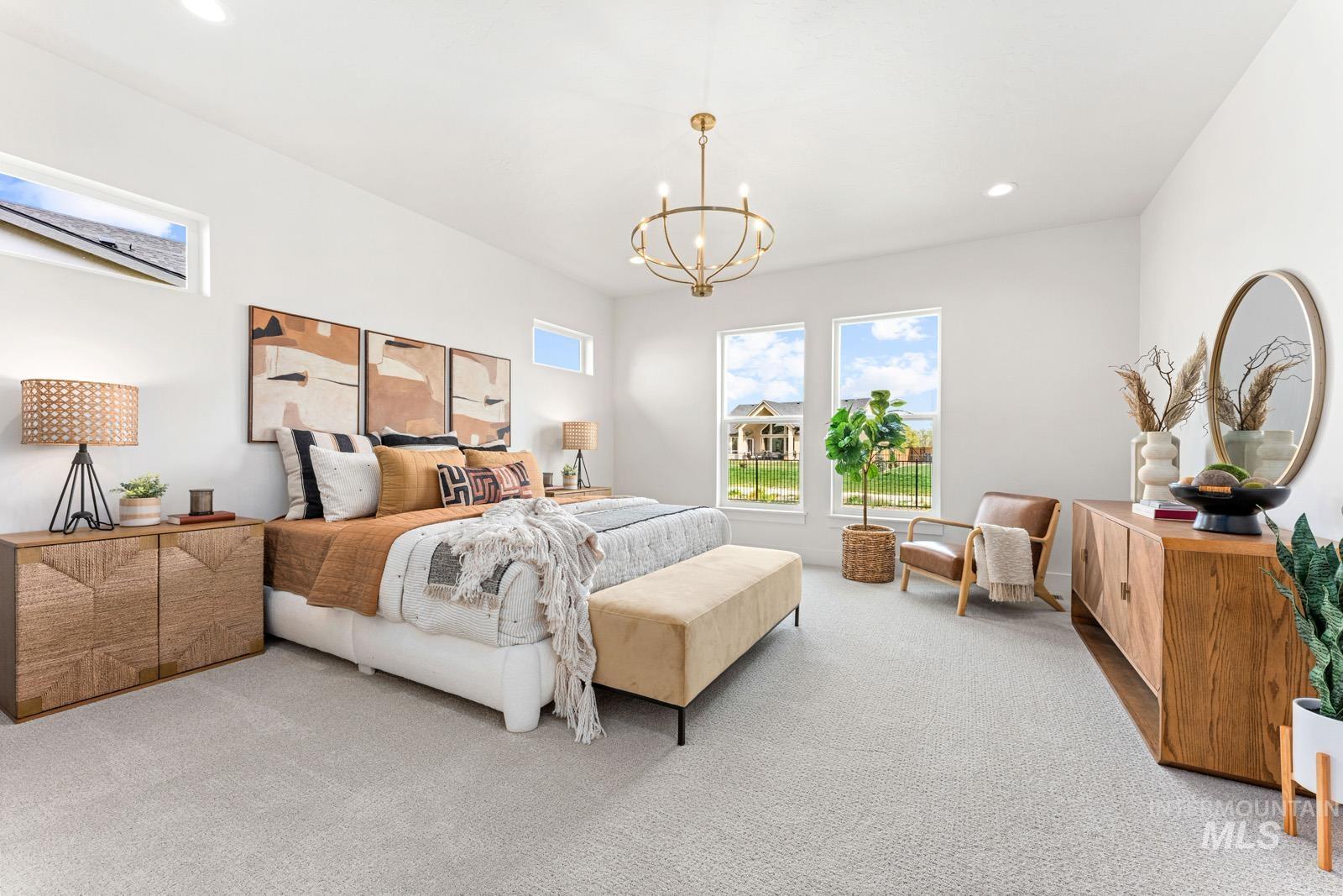 6792 Saddle Bred Way Star, ID 83669 - Photo 16 of 50 Bedroom featuring light colored carpet and suspended lighting