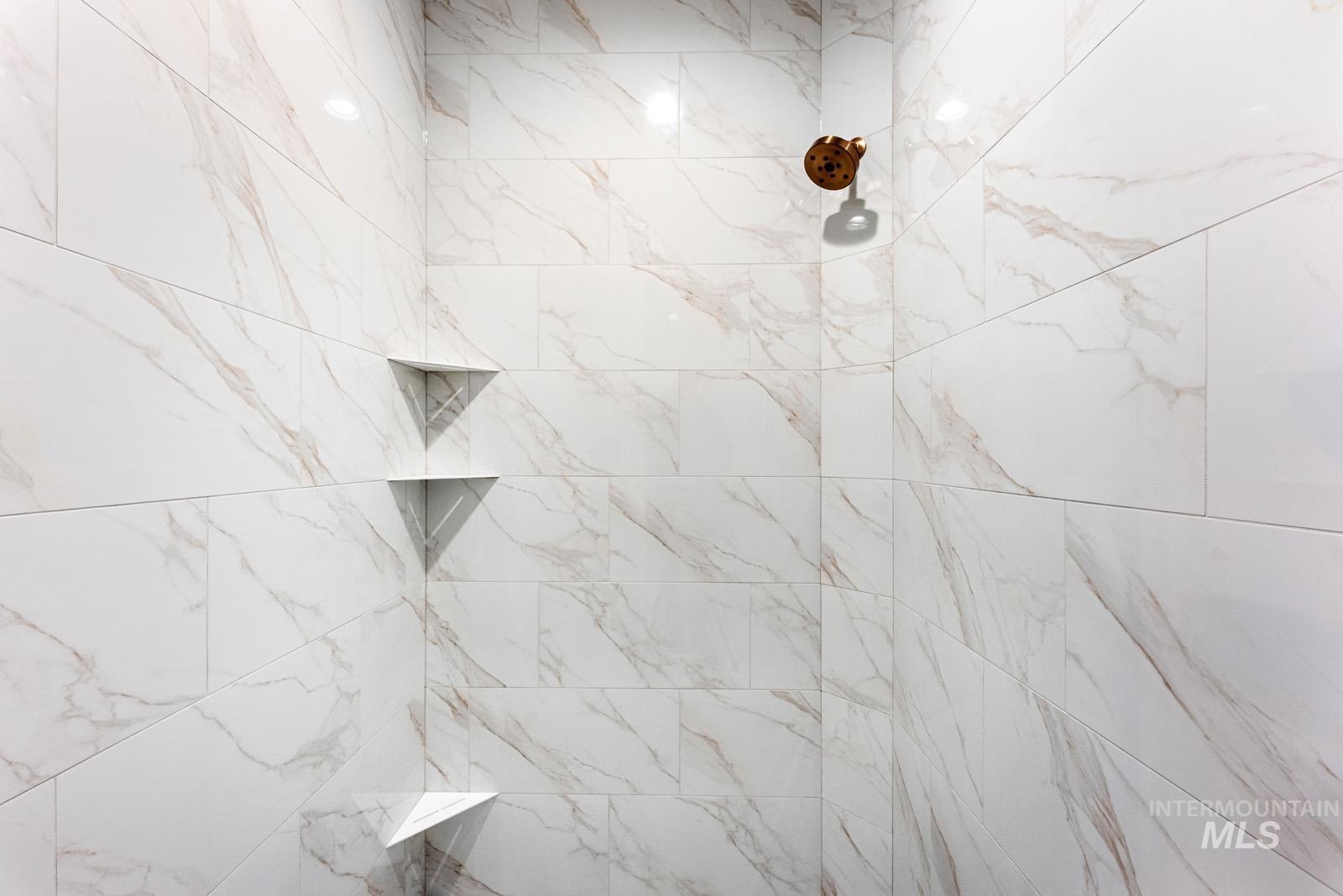 6792 Saddle Bred Way Star, ID 83669 - Photo 20 of 50 Bathroom view of tiled shower