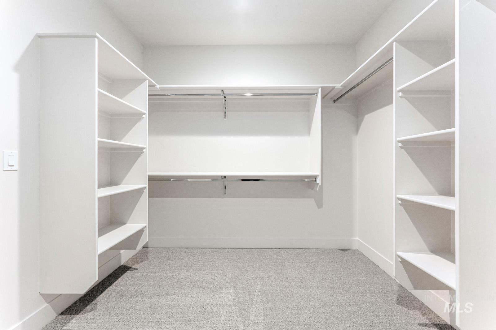 6792 Saddle Bred Way Star, ID 83669 - Photo 23 of 50 Walk in closet with light colored carpet