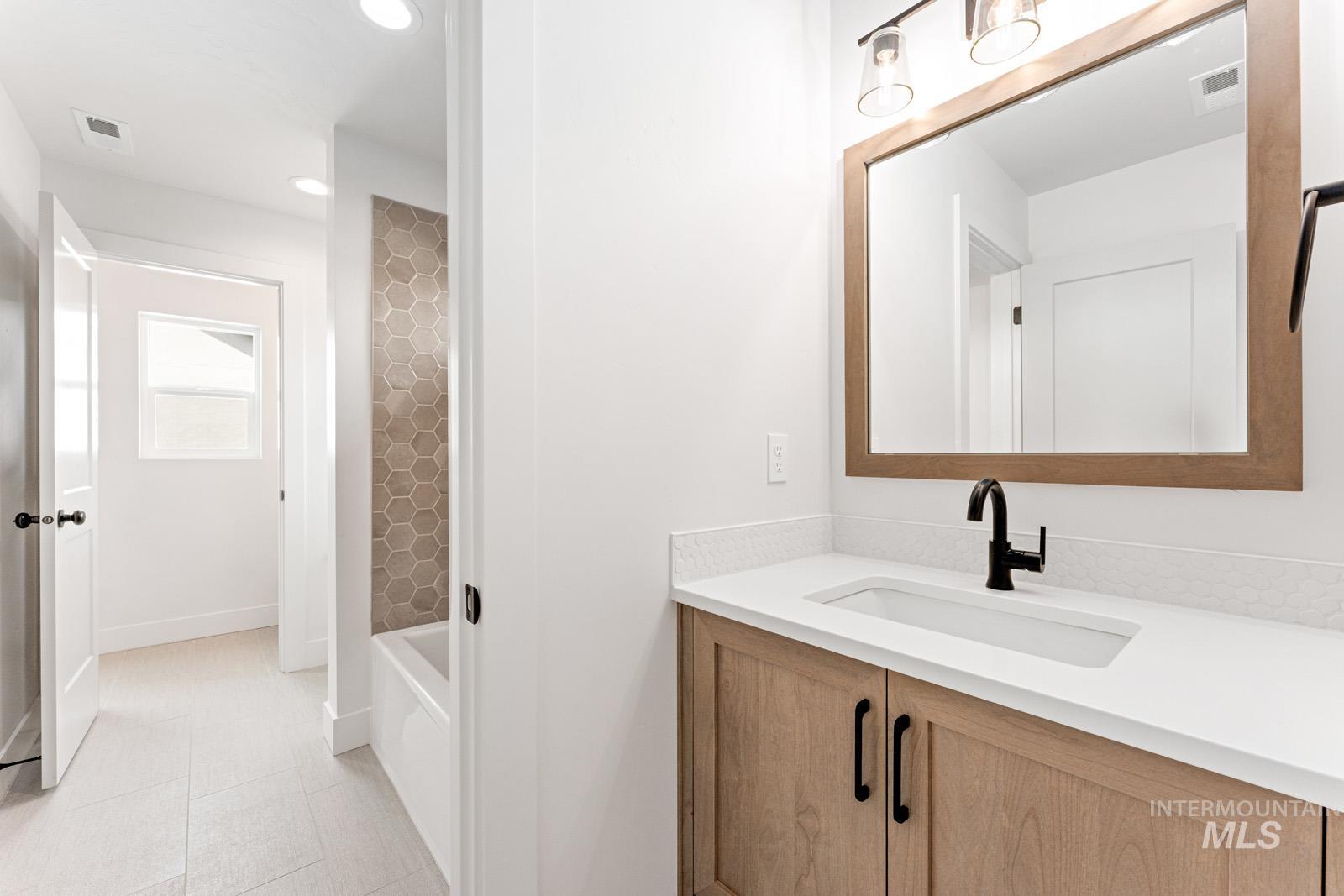 6792 Saddle Bred Way Star, ID 83669 - Photo 27 of 50 Full bathroom with vanity and recessed lighting