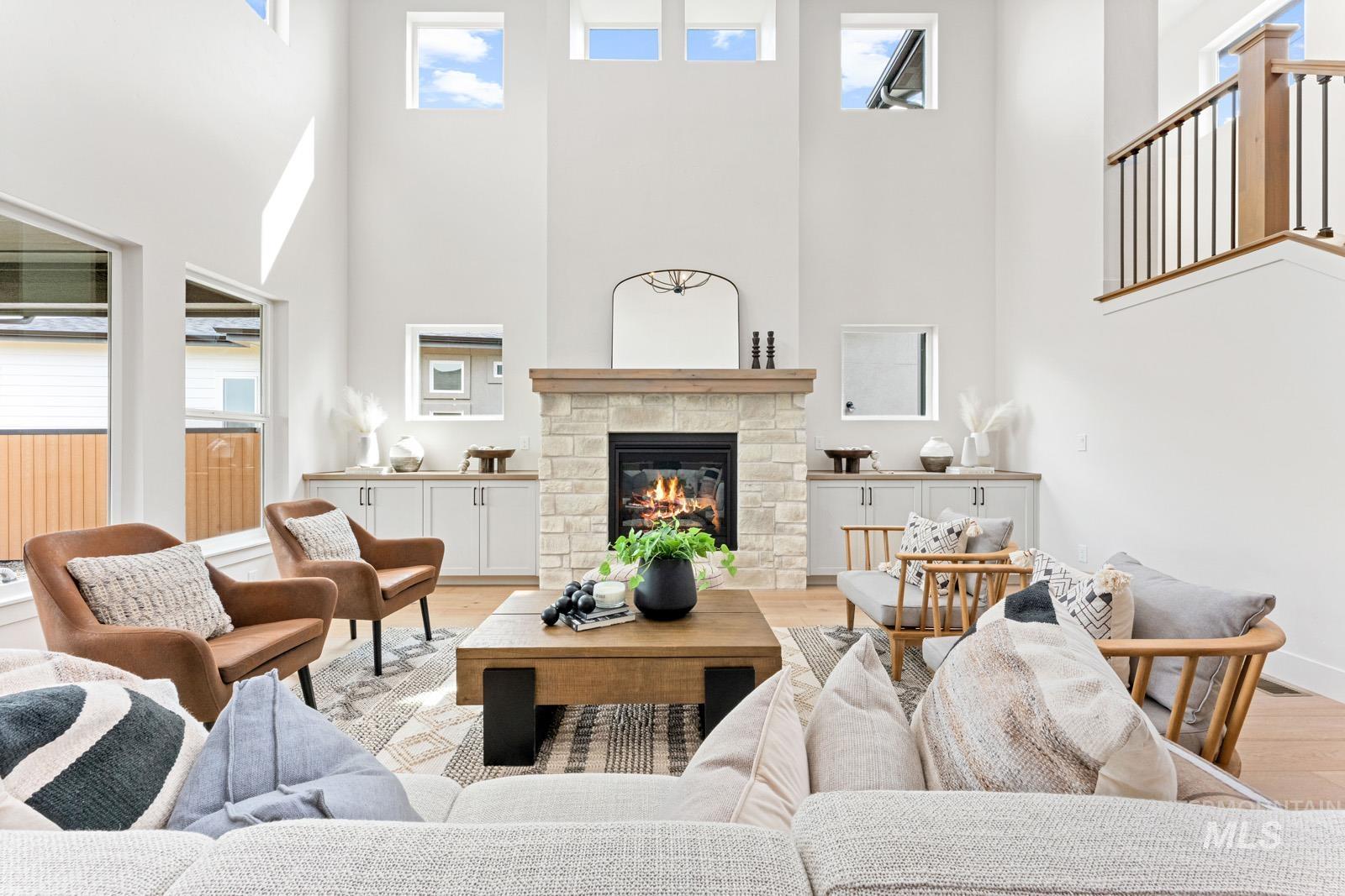 6792 Saddle Bred Way Star, ID 83669 - Photo 4 of 50 Living area featuring wood finished floors and a fireplace