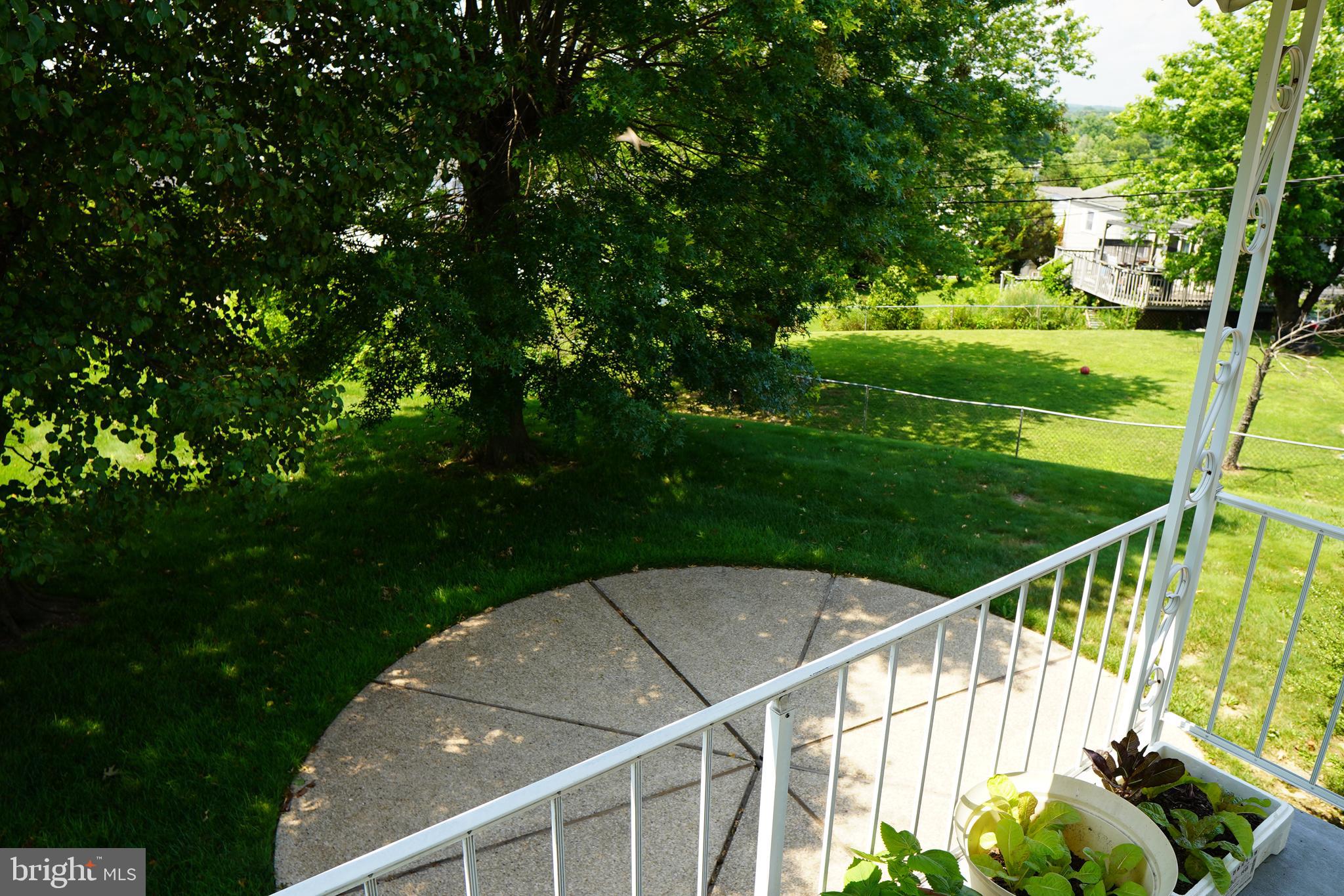 1512 Customs Road Baltimore, MD 21237 - Photo 41 of 43 a view of a balcony with yard