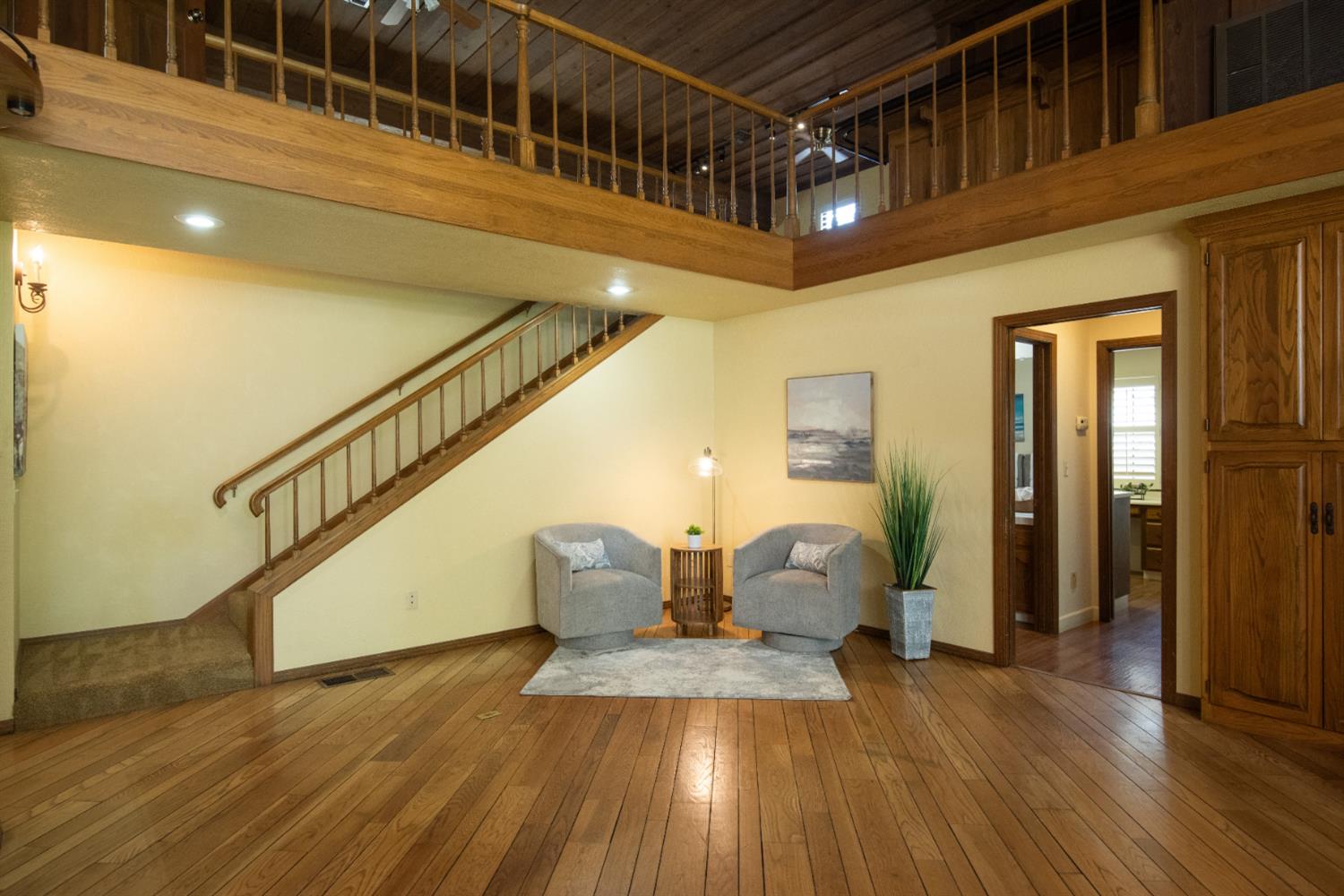 925 Scenic Court Modesto, CA 95355 - Photo 12 of 62 a view of entryway and hall with wooden floor
