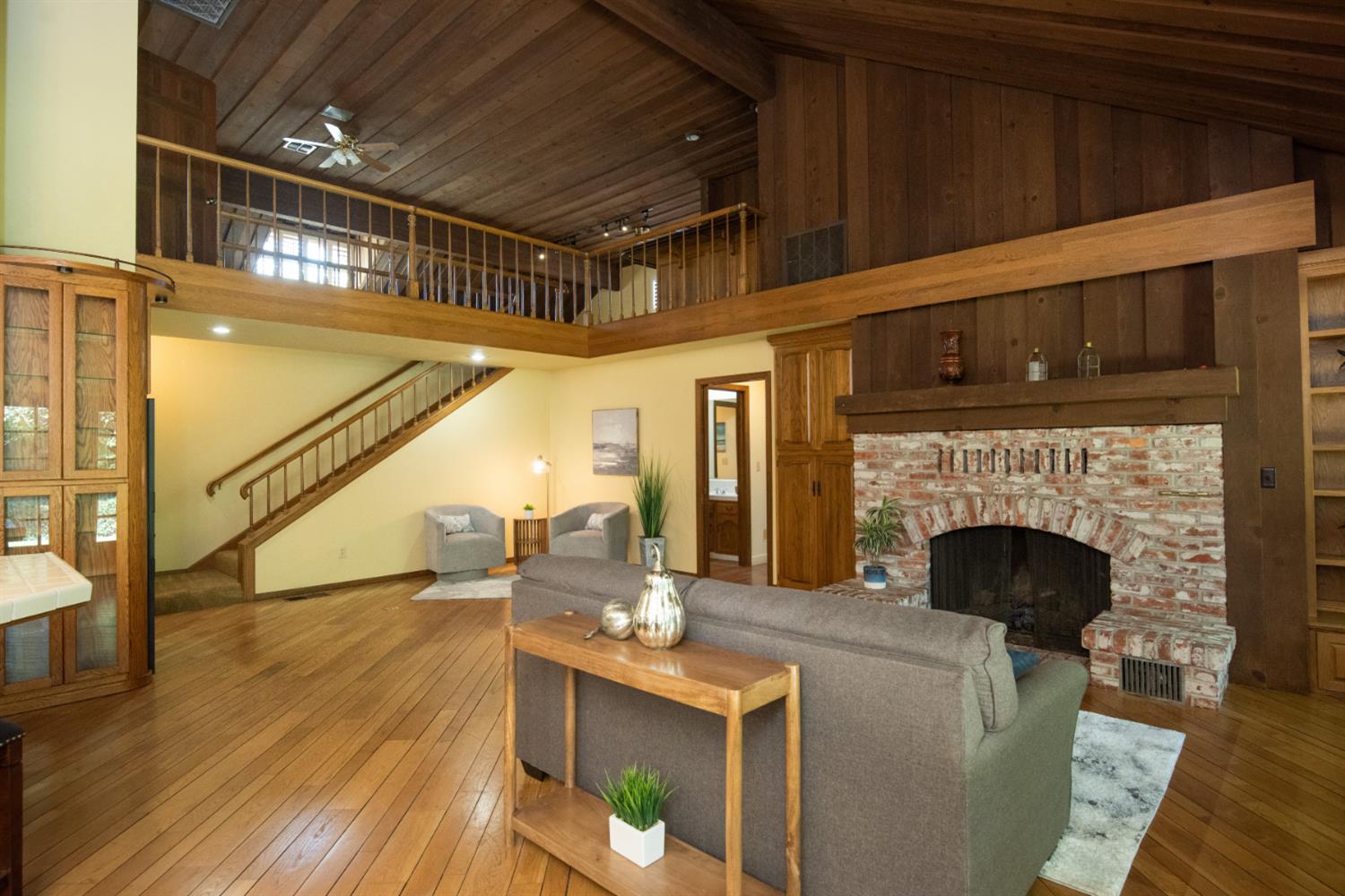 925 Scenic Court Modesto, CA 95355 - Photo 14 of 62 a living room with furniture and a fireplace