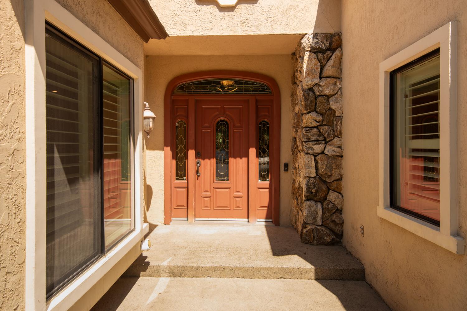 925 Scenic Court Modesto, CA 95355 - Photo 4 of 62 a front view of a house with a blue gate