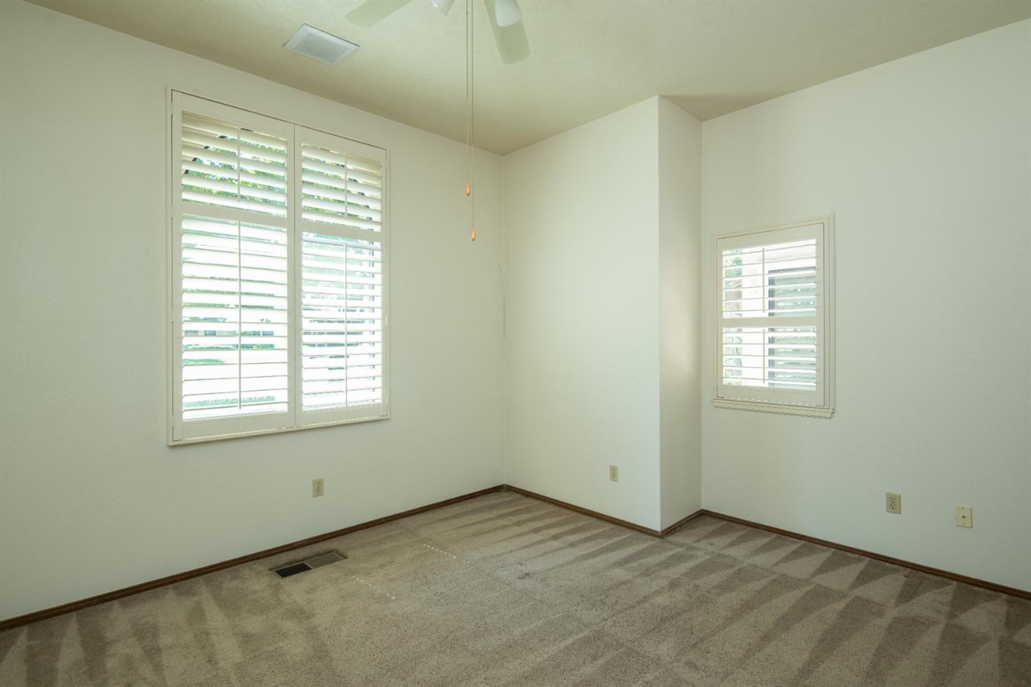 925 Scenic Court Modesto, CA 95355 - Photo 46 of 62 an empty room with a window