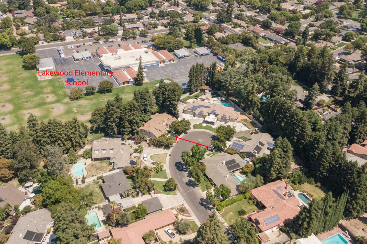 925 Scenic Court Modesto, CA 95355 - Photo 57 of 62 an aerial view of residential houses with outdoor space