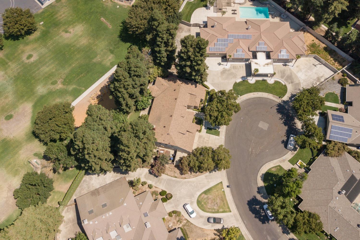 925 Scenic Court Modesto, CA 95355 - Photo 59 of 62 an aerial view of a house with a yard