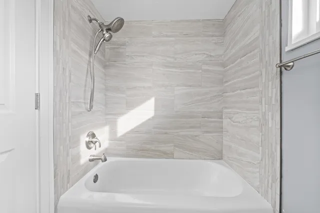 a bathroom with a bathtub